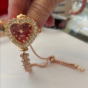 Heart-Shaped Quartz Watch with Gold and Red Accents